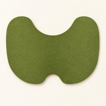 Green butterfly-shaped knee patch shown on a neutral background