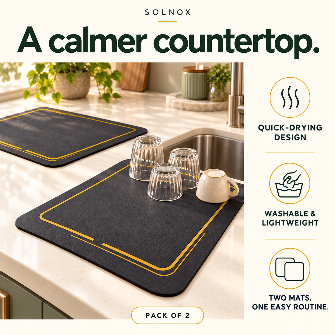 Two charcoal kitchen drying mats with gold border beside a sink